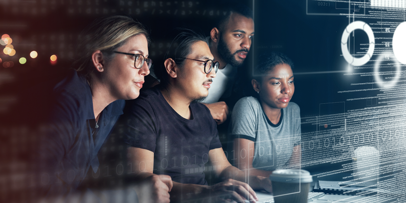 4-people-looking-at-binary-code screen-1400x700