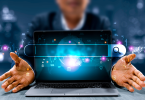 Hands-opening-laptop-search-bar